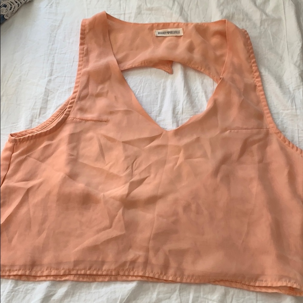 Peach top with heart cut out in back
